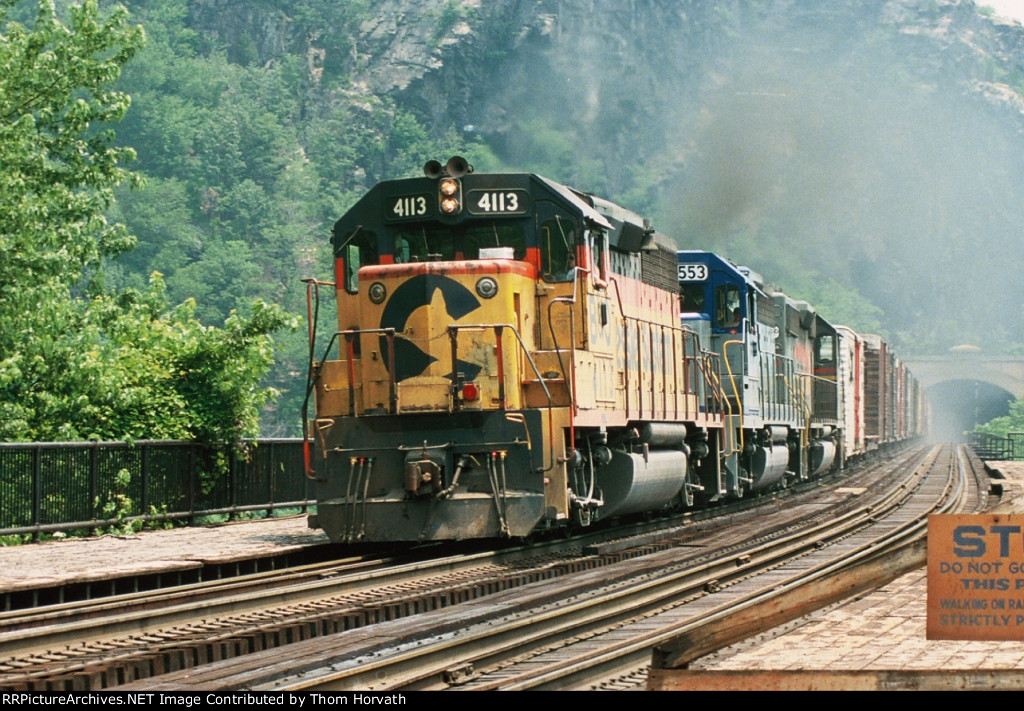 CSX 4113 leads a mixed consist west over the Potomac River